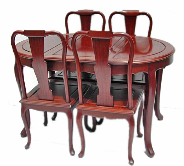 Solid rosewood French style dining table and 4 chairs.
