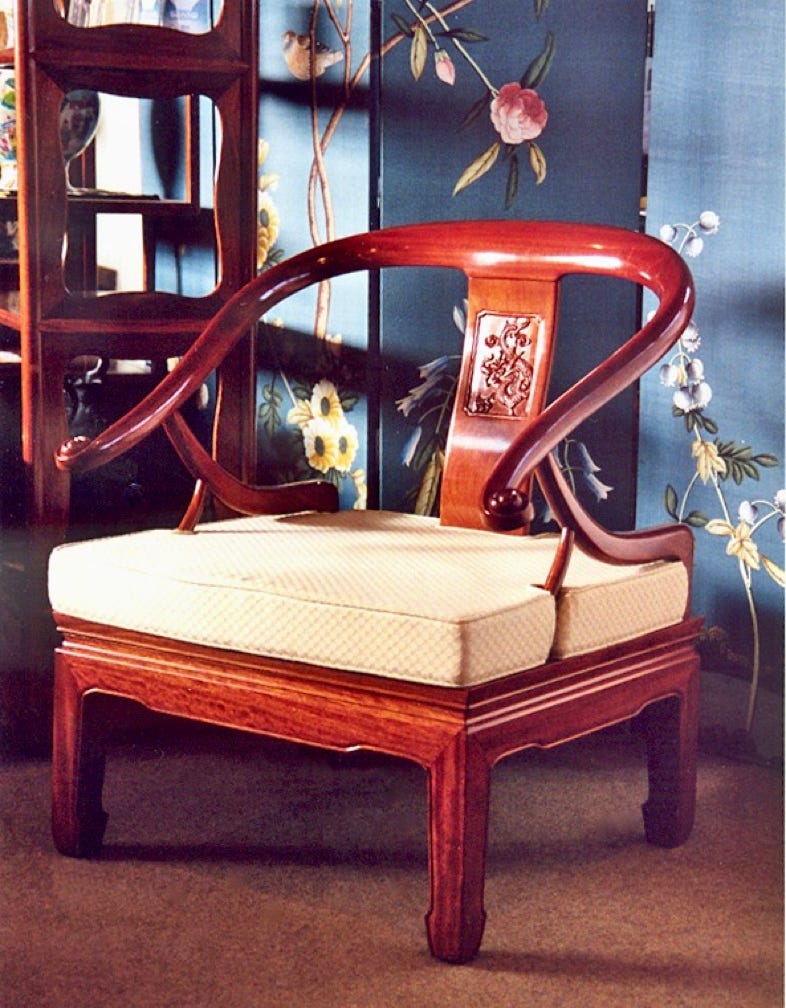 Oriental horseshoe back rosewood sofa chair with carved back